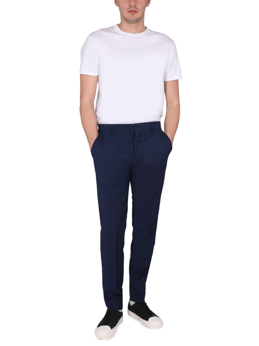 AMI Paris CIGARETTE FIT PANTS HTR004279491