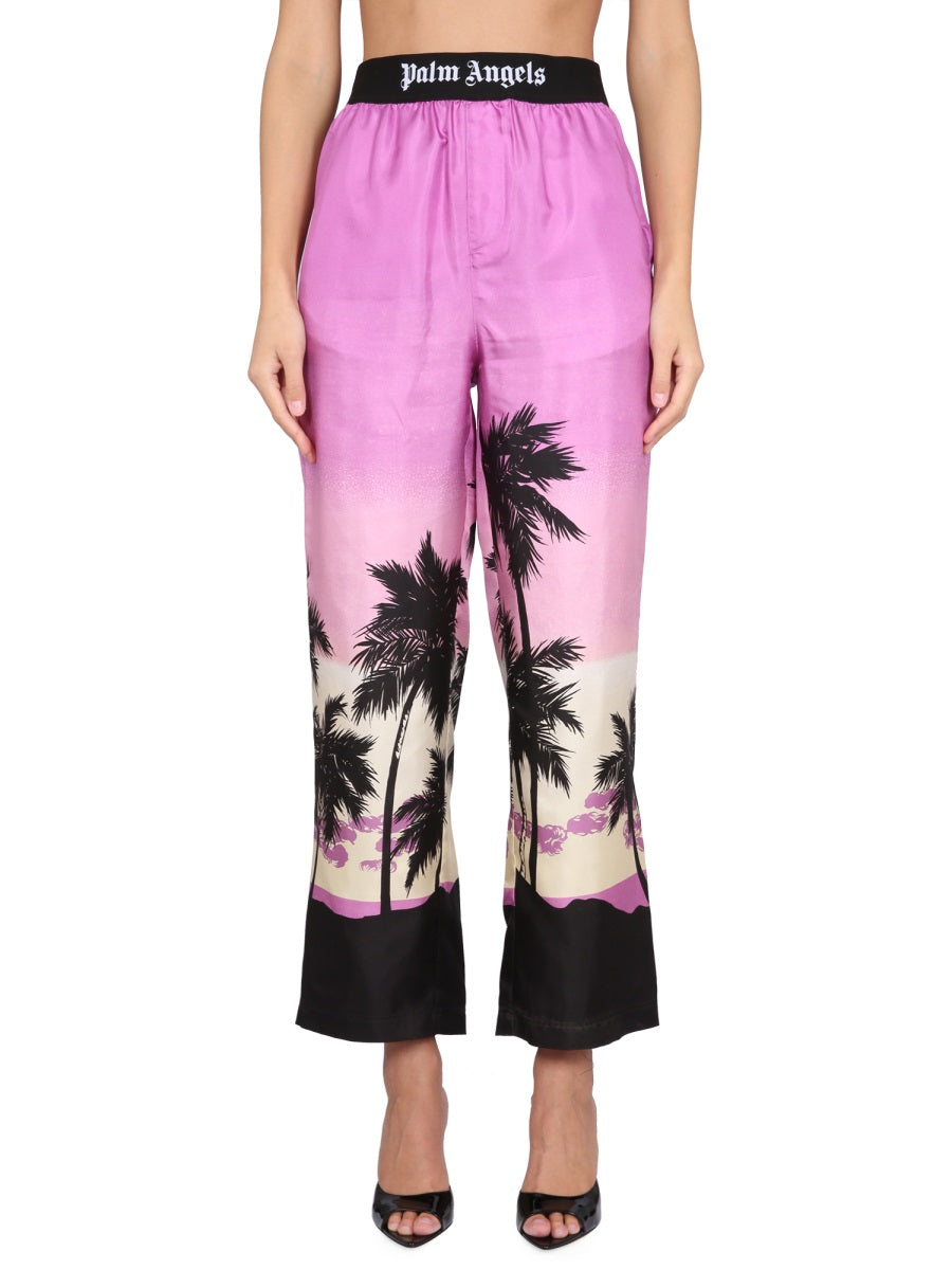 Palm Angels PANTS WITH SUNSET PRINT PWCA110S23FAB0013701