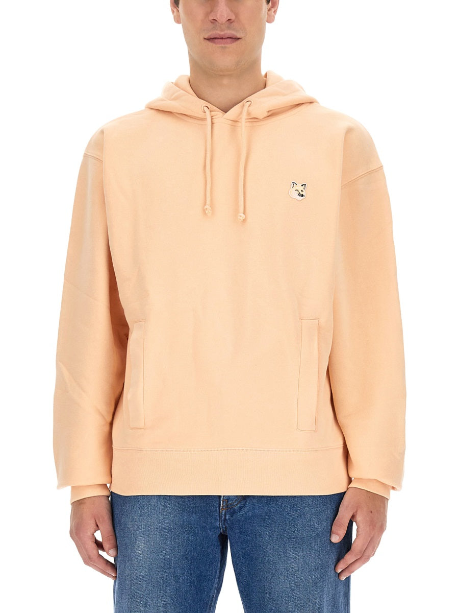 Maison Kitsuné SWEATSHIRT WITH FOX PATCH KM00327KM0027PEACH