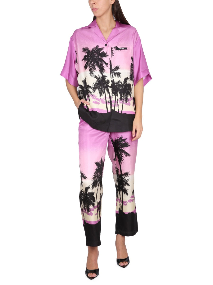 Palm Angels PANTS WITH SUNSET PRINT PWCA110S23FAB0013701