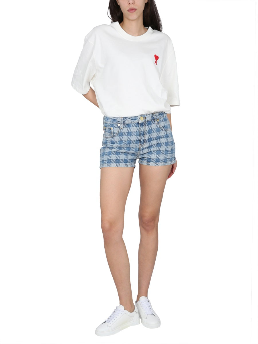 AMI Paris DENIM SHORTS FSO104DE0010448